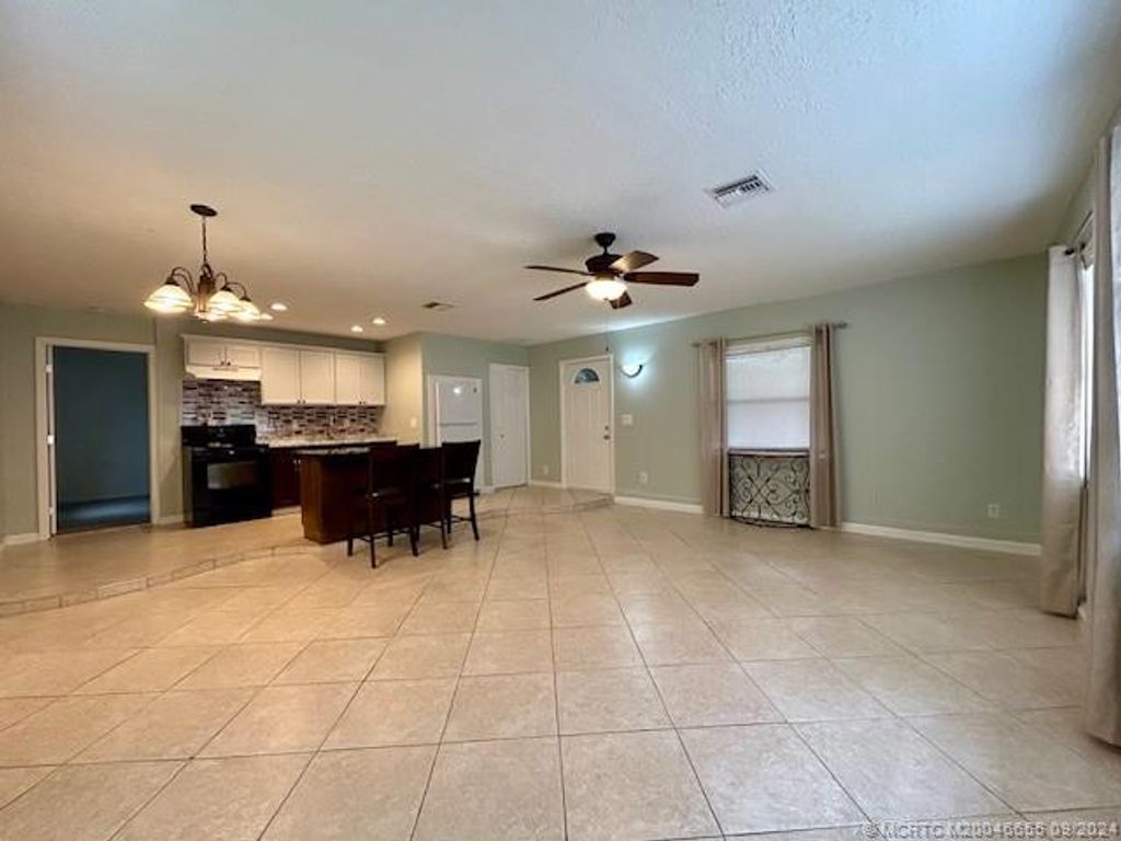 Photo of 491 SW Curtis Street, Port Saint Lucie, FL 34983 (MLS # M20046655)