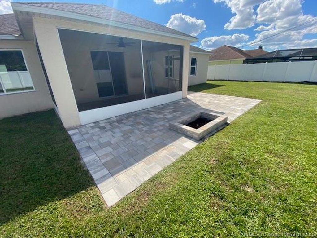 Photo of 1265 SE Petunia Avenue, Port Saint Lucie, FL 34952 (MLS # M20041559)