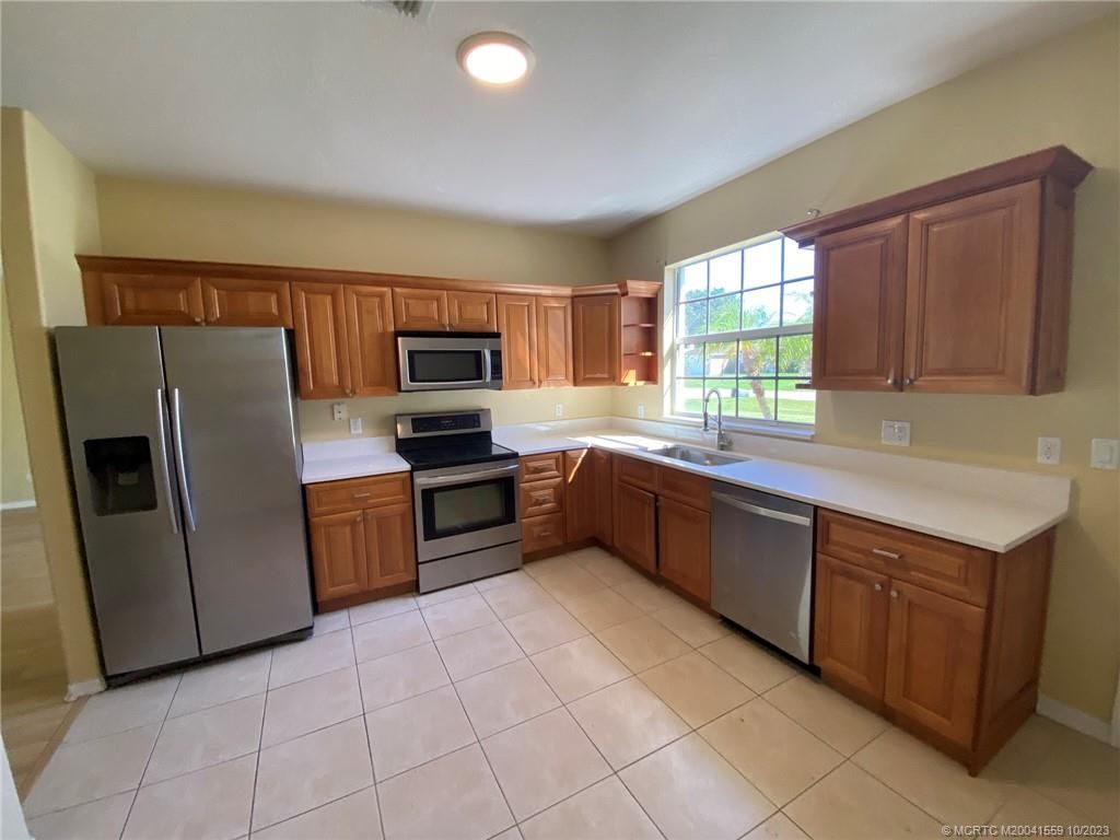 Photo of 1265 SE Petunia Avenue, Port Saint Lucie, FL 34952 (MLS # M20041559)