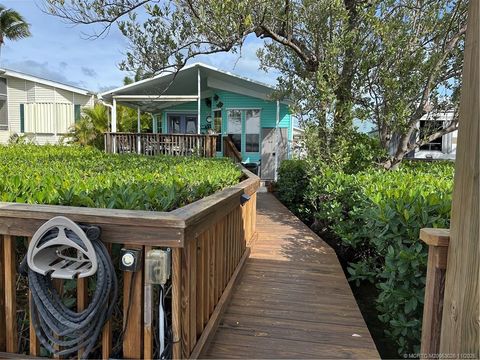 Photo of 5359 Montego Circle, Hutchinson Island, FL 34949 (MLS # M20053026)