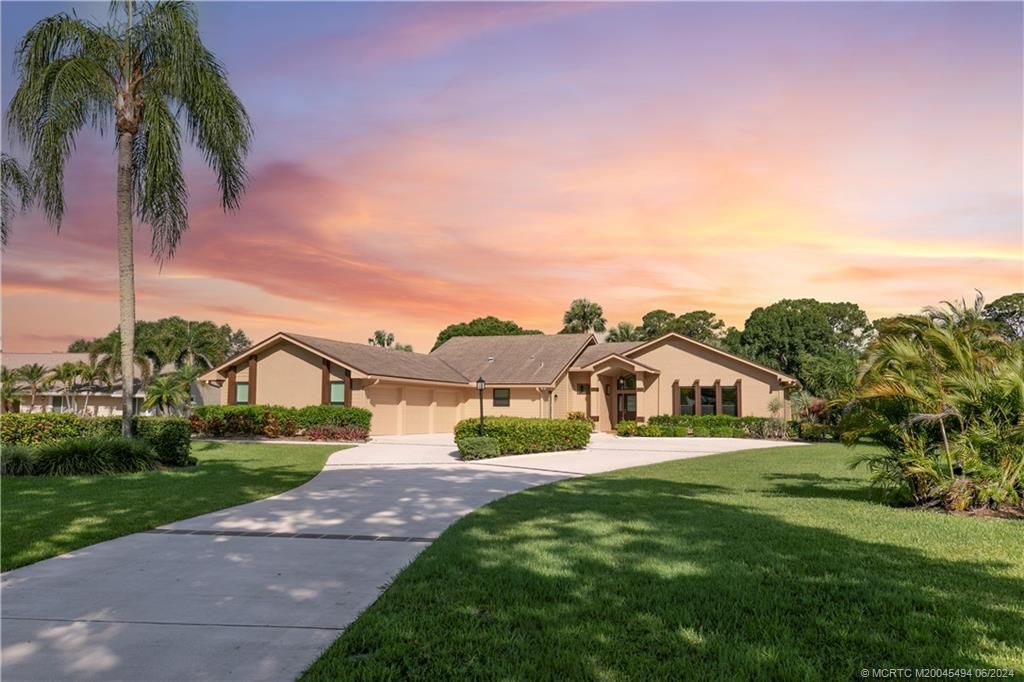 Photo of 2202 SW Racquet Club Drive, Palm City, FL 34990 (MLS # M20045494)