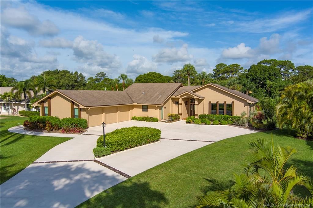 Photo of 2202 SW Racquet Club Drive, Palm City, FL 34990 (MLS # M20045494)