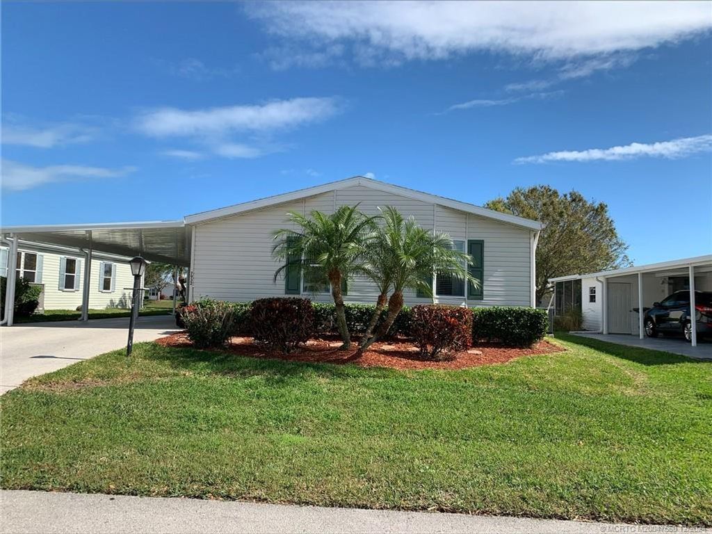 Photo of 7932 Meadowlark Lane, Port Saint Lucie, FL 34952 (MLS # M20047660)