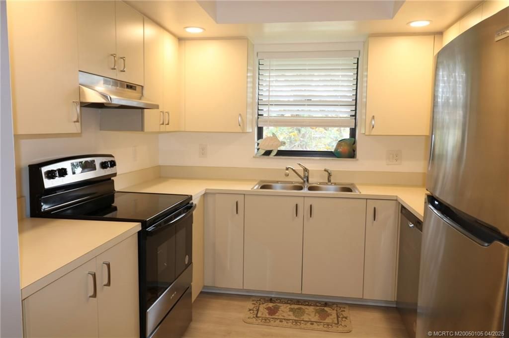 Photo of 301 SW South River Drive #203, Stuart, FL 34997 (MLS # M20050105)