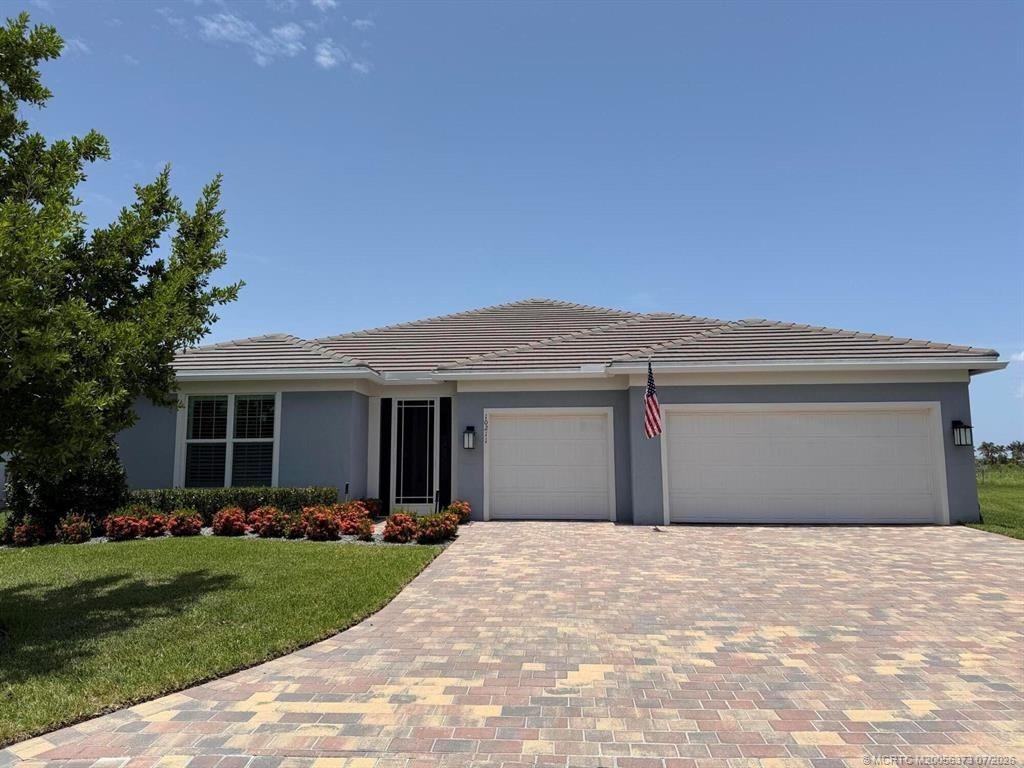 Photo of 10211 SW Pervenche Lane, Port Saint Lucie, FL 34987 (MLS # M20056373)