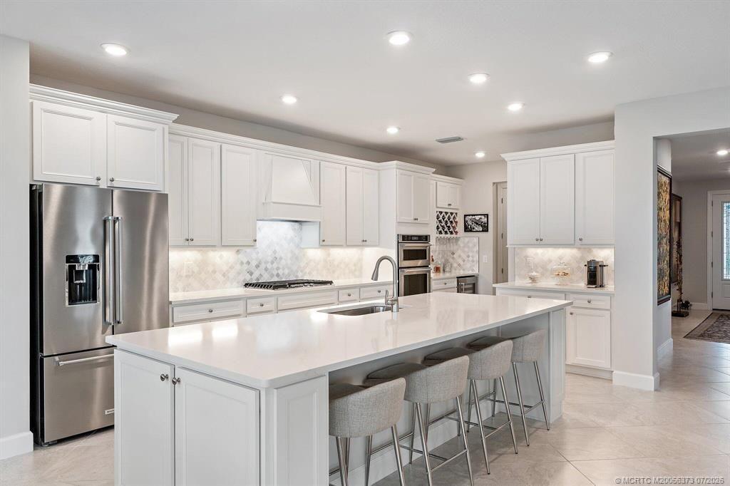 Photo of 10211 SW Pervenche Lane, Port Saint Lucie, FL 34987 (MLS # M20056373)