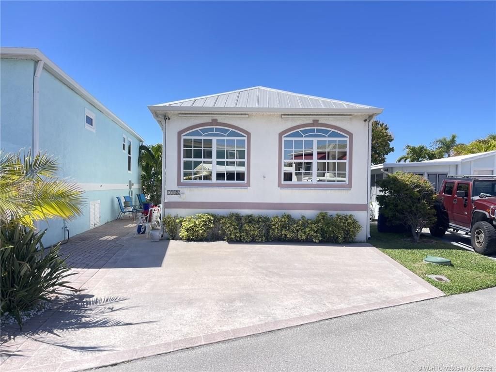 Photo of 1352 Nettles Boulevard, Jensen Beach, FL 34957 (MLS # M20054777)