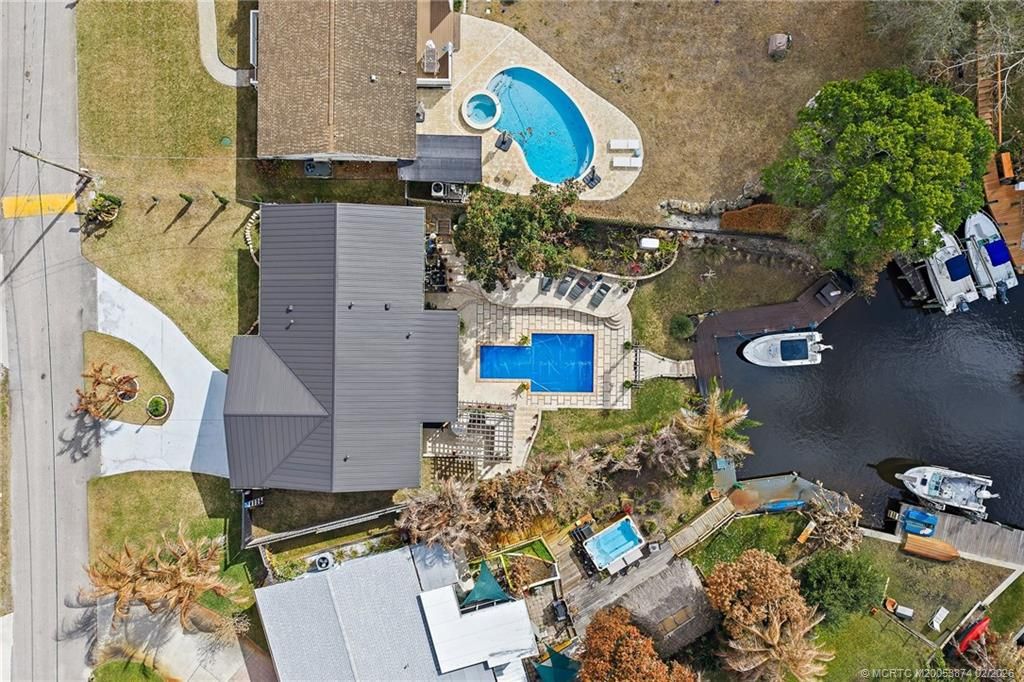 Photo of 1430 SW Covered Bridge Drive, Palm City, FL 34990 (MLS # M20053874)