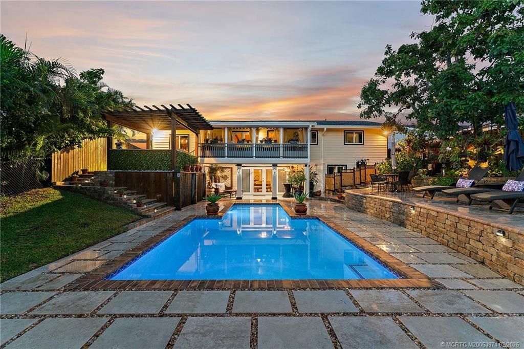 Photo of 1430 SW Covered Bridge Drive, Palm City, FL 34990 (MLS # M20053874)