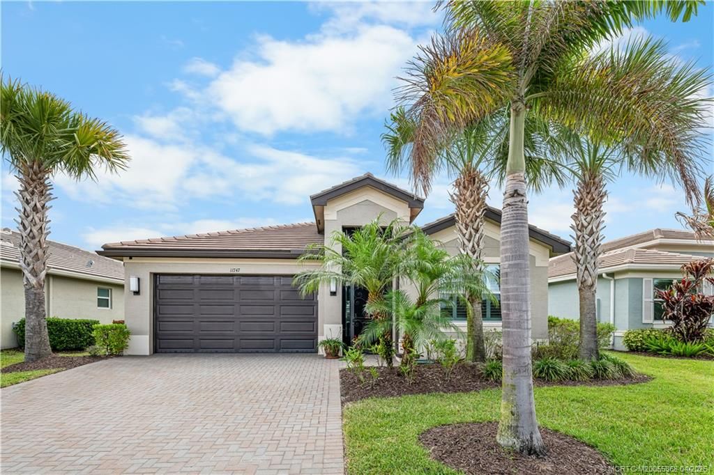 Photo of 11747 SW Hawthorne Hill Road, Port Saint Lucie, FL 34987 (MLS # M20055368)