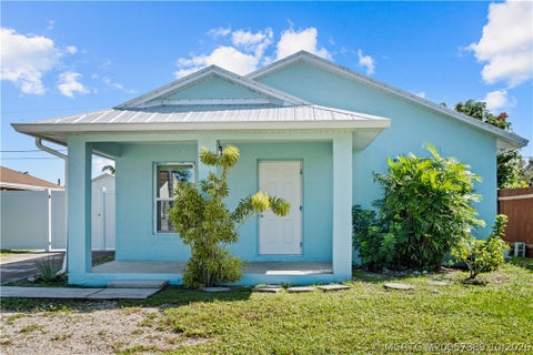 Photo of 5807 SE Mitzi Lane, Stuart, FL 34997 (MLS # M20057389)