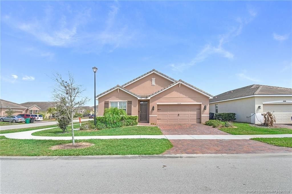 Photo of 10575 SW Jem Street, Port Saint Lucie, FL 34987 (MLS # M20054573)
