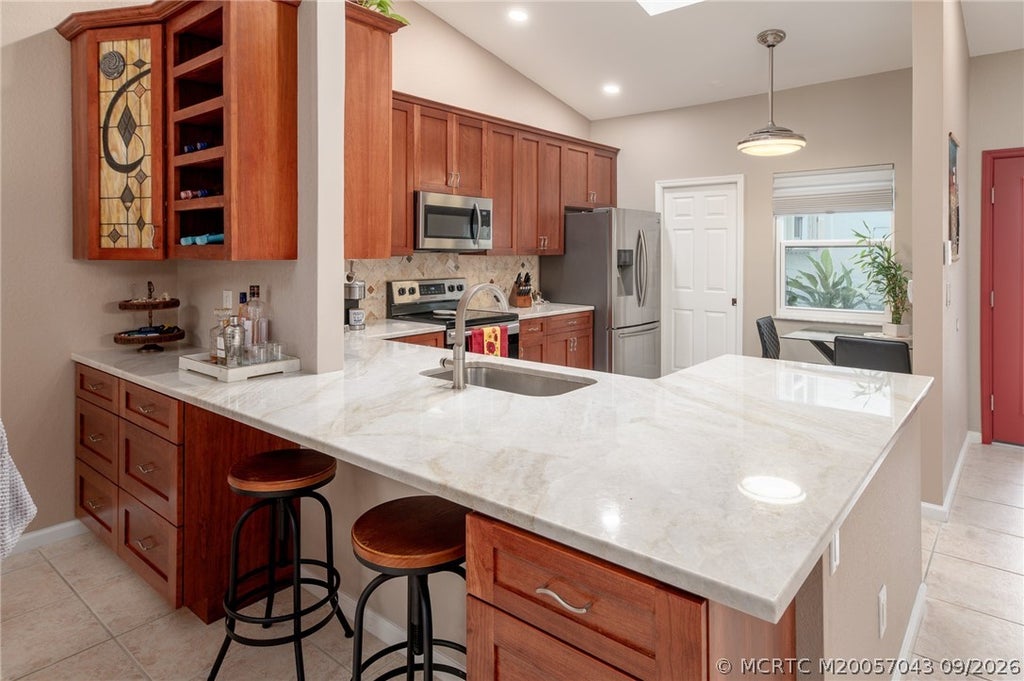 Photo of 1499 SW Greens Pointe Way, Palm City, FL 34990 (MLS # M20057043)