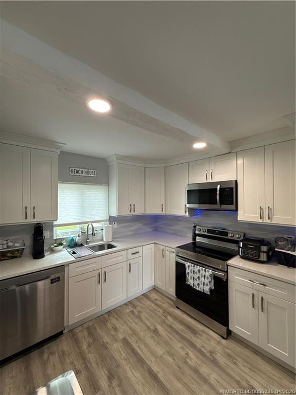 Photo of 1561 NE 12th Terrace NE, Jensen Beach, FL 34957 (MLS # M20055235)