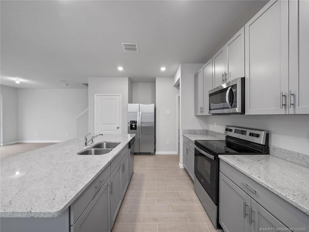 Photo of 234 Osprey Preserve Boulevard, Jensen Beach, FL 34957 (MLS # M20034192)