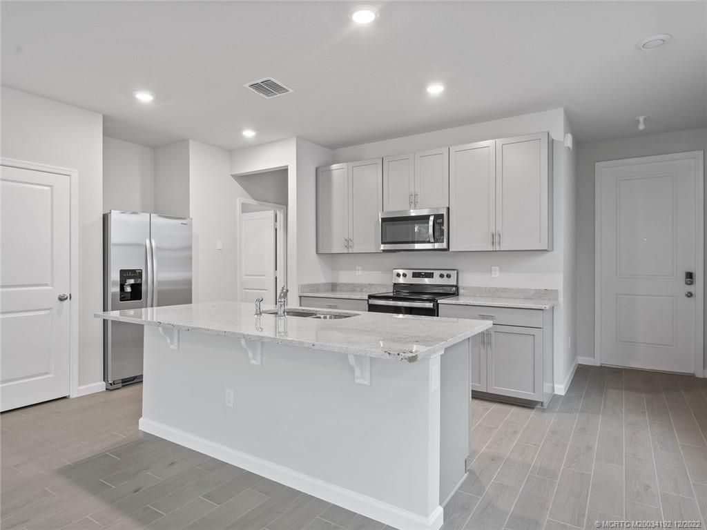 Photo of 234 Osprey Preserve Boulevard, Jensen Beach, FL 34957 (MLS # M20034192)