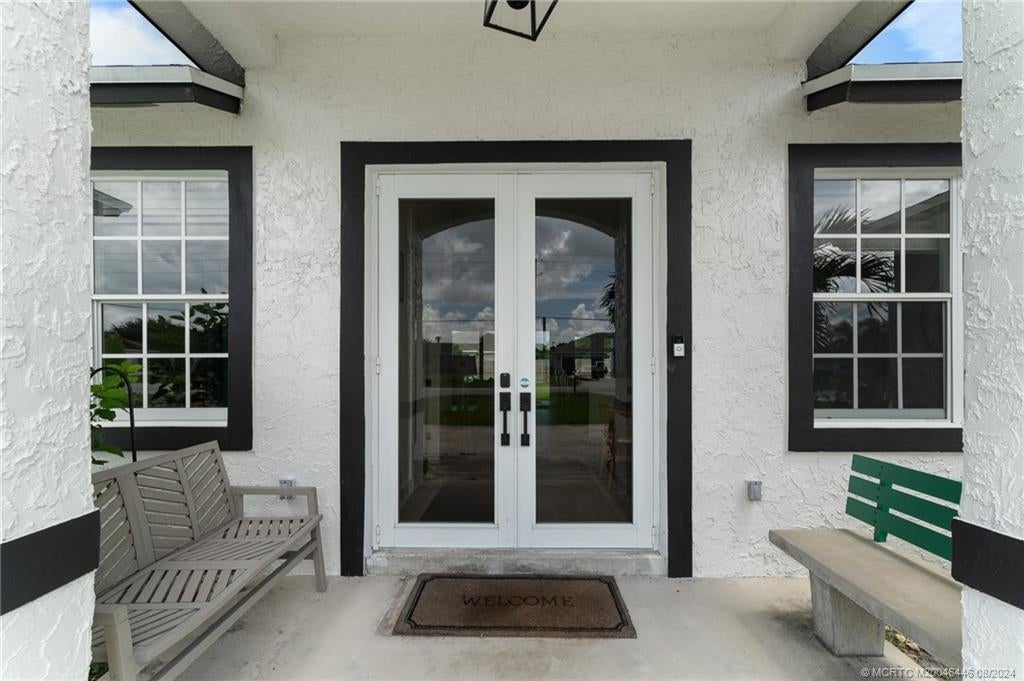 Photo of 2001 SE Berkshire Boulevard, Port Saint Lucie, FL 34952 (MLS # M20046446)
