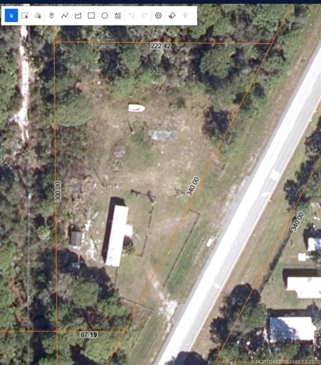 Photo of 6415 Turnpike Feeder Road, Fort Pierce, FL 34951 (MLS # M20052940)