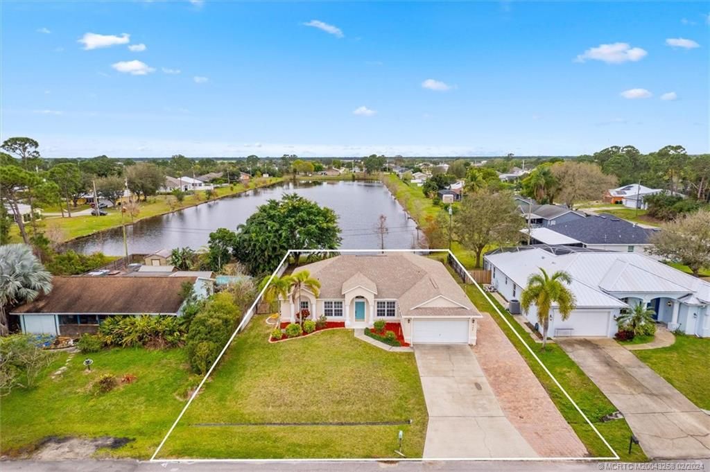 Photo of 344 SW Columbus Drive, Port Saint Lucie, FL 34953 (MLS # M20043258)