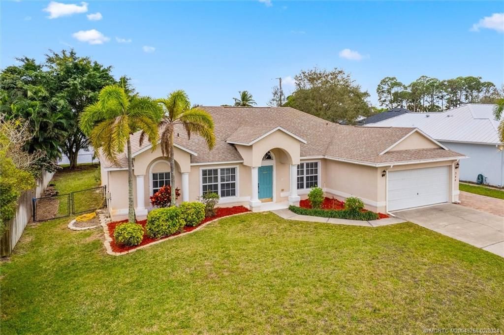 Photo of 344 SW Columbus Drive, Port Saint Lucie, FL 34953 (MLS # M20043258)