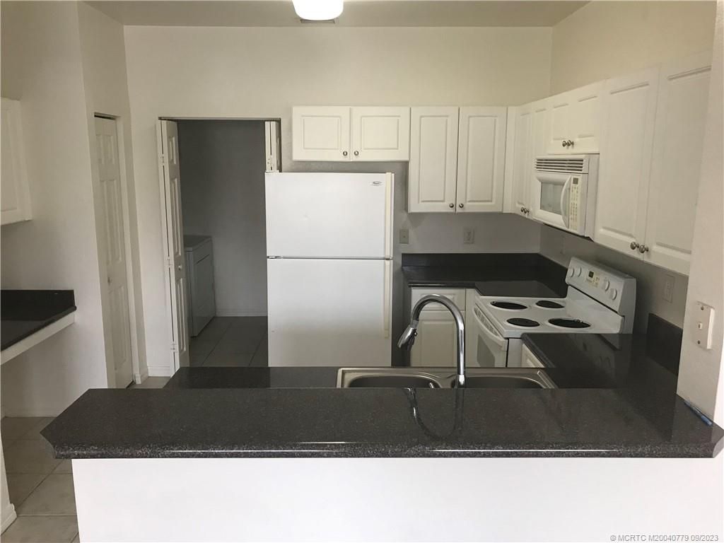 Photo of 290 SE Kitching Circle, Stuart, FL 34994 (MLS # M20040779)