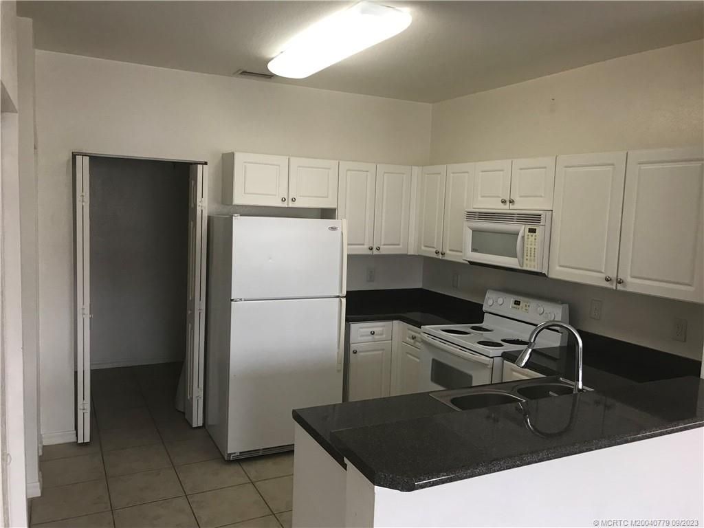 Photo of 290 SE Kitching Circle, Stuart, FL 34994 (MLS # M20040779)