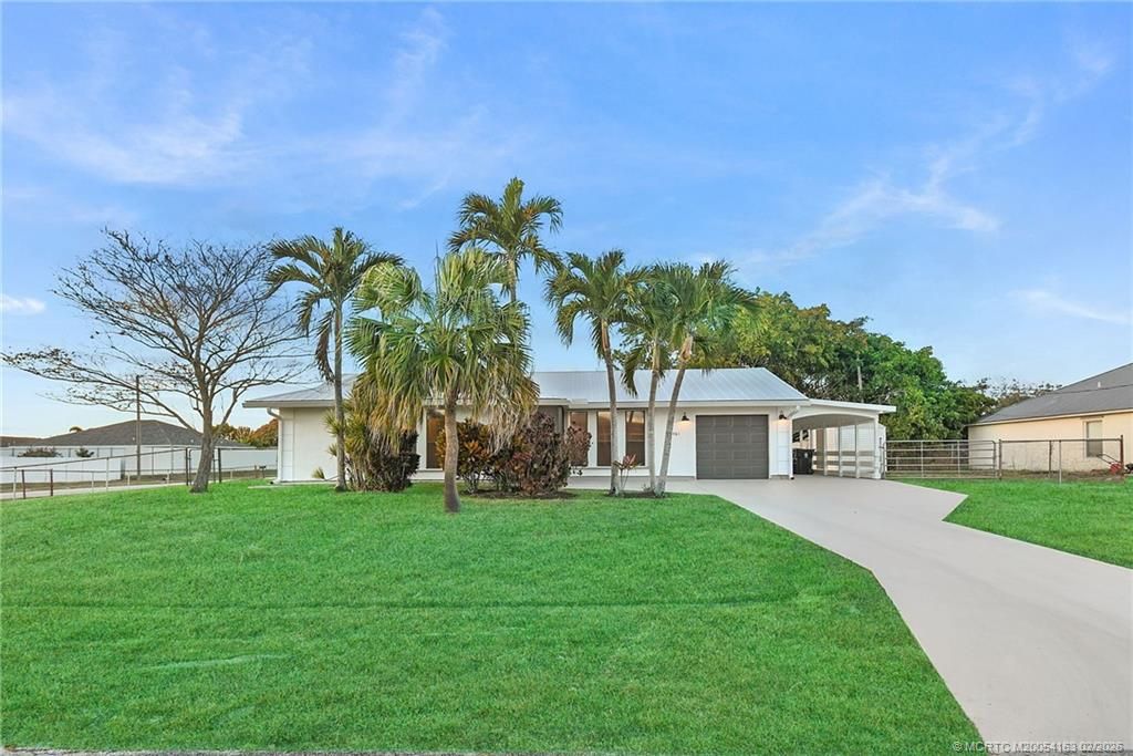 Photo of 981 SW Bay State Road, Port Saint Lucie, FL 34953 (MLS # M20054163)