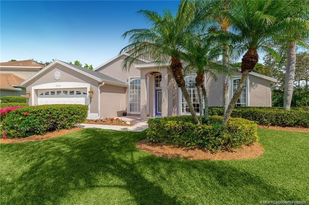 Photo of 376 NW Canna Way, Jensen Beach, FL 34957 (MLS # M20049707)