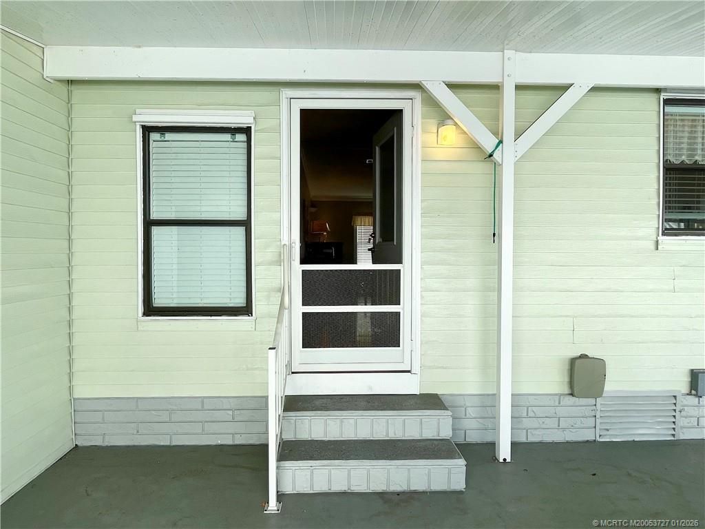 Photo of 14581 Divot Drive SW, Indiantown, FL 34956 (MLS # M20053727)