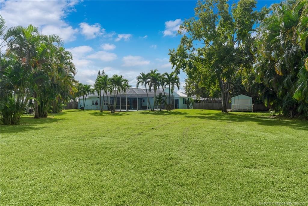 Photo of 569 NE Lima Vias, Jensen Beach, FL 34957 (MLS # M20041527)