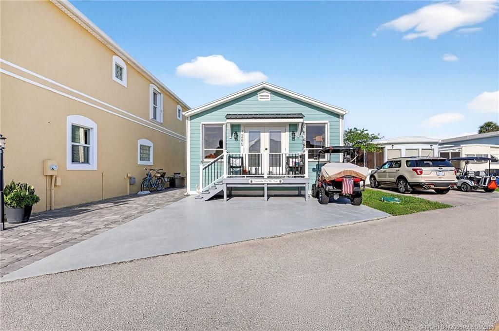 Photo of 1285 Nettles Boulevard, Jensen Beach, FL 34957 (MLS # M20054606)