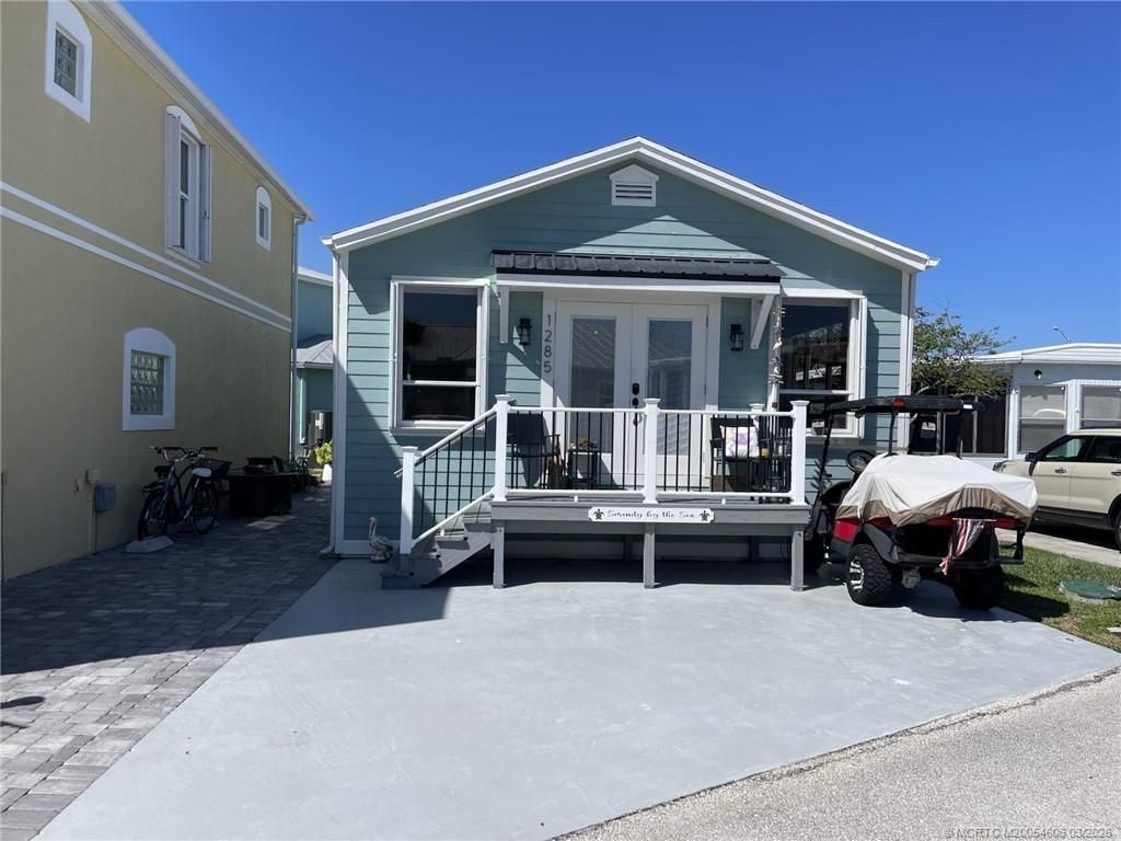 Photo of 1285 Nettles Boulevard, Jensen Beach, FL 34957 (MLS # M20054606)