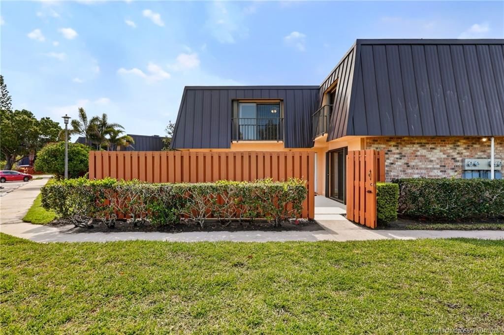 Photo of 6419 SE Windsong Lane, Stuart, FL 34997 (MLS # M20055127)