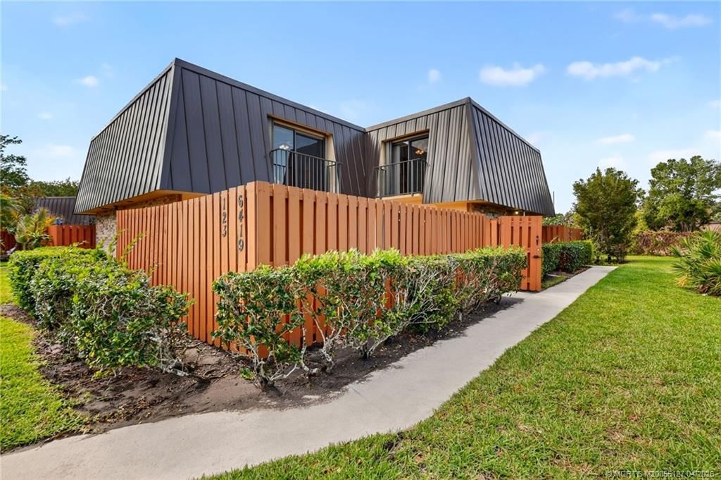 Photo of 6419 SE Windsong Lane, Stuart, FL 34997 (MLS # M20055127)