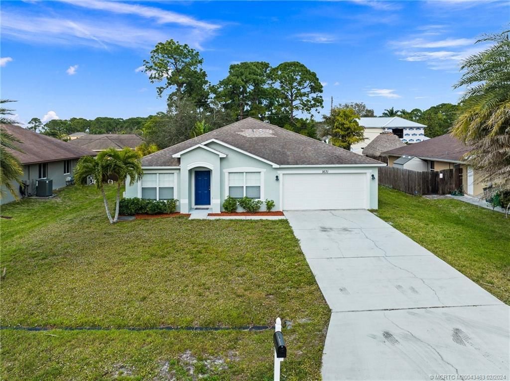 Photo of 1631 SW Buttercup Avenue, Port Saint Lucie, FL 34953 (MLS # M20043463)