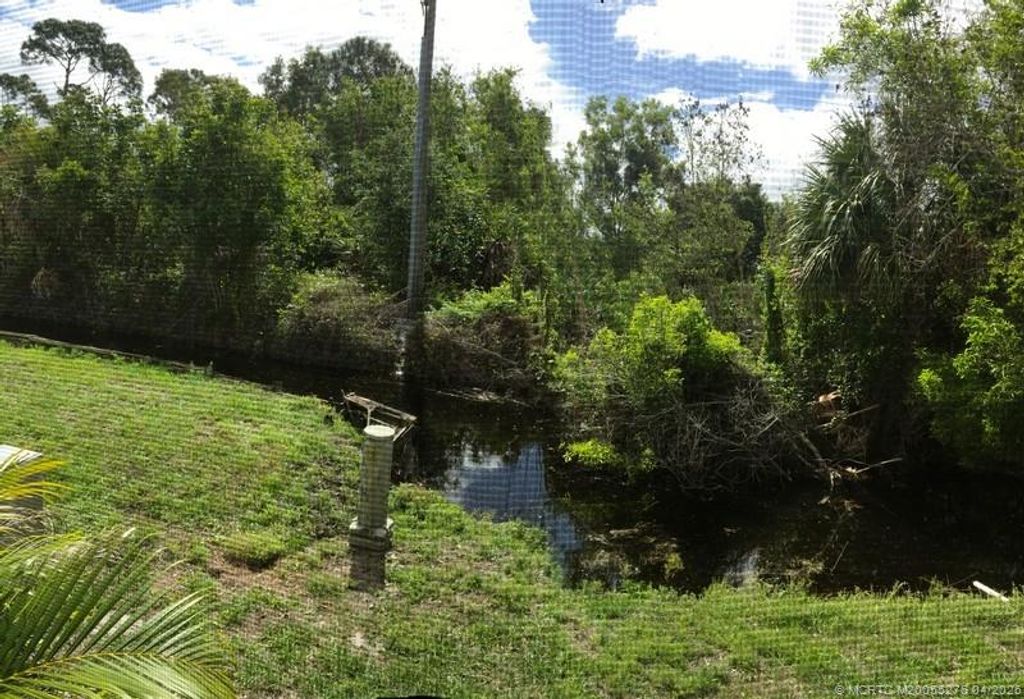 Photo of 14591 SW Divot Drive Dr #A-20, Indiantown, FL 34956 (MLS # M20055276)