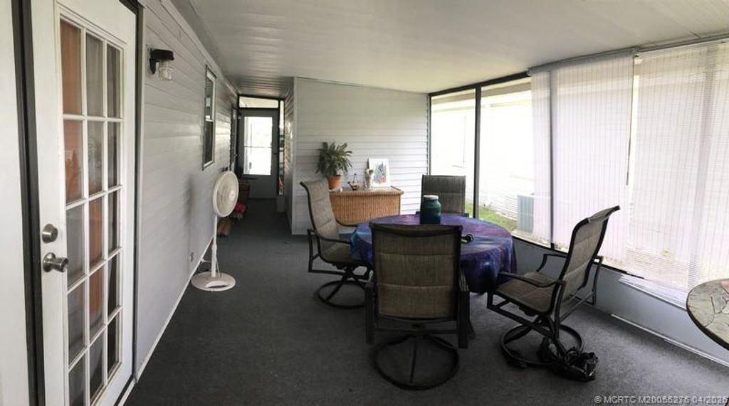 Photo of 14591 SW Divot Drive Dr #A-20, Indiantown, FL 34956 (MLS # M20055276)