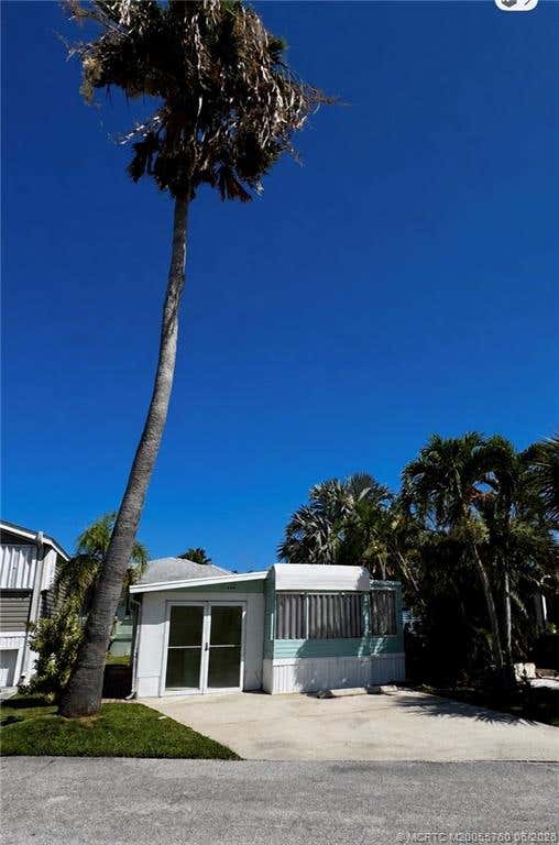 Photo of 466 Nettles Boulevard, Jensen Beach, FL 34957 (MLS # M20055760)
