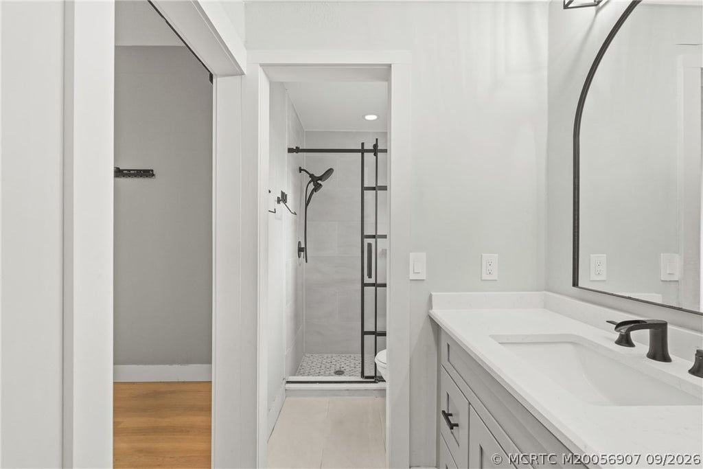 Photo of 411 SW Namoit Place, Port Saint Lucie, FL 34953 (MLS # M20056907)