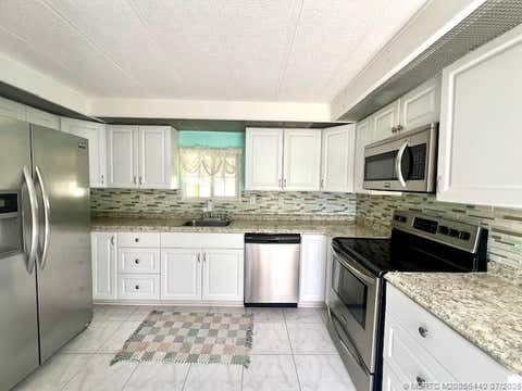 Photo of 4169 70th Lane N #1047, West Palm Beach, FL 33404 (MLS # M20056440)