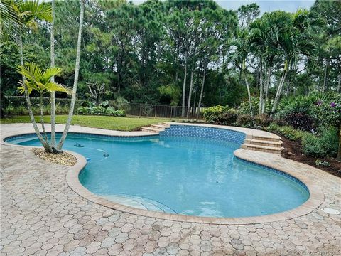 Photo of 2609 SW Mayacoo Way, Palm City, FL 34990 (MLS # M20053470)