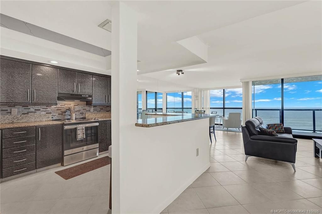 Photo of 10410 S Ocean Drive #505, Jensen Beach, FL 34957 (MLS # M20053042)