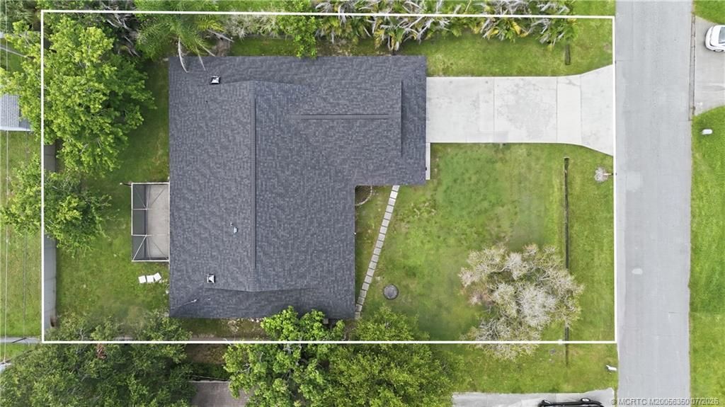 Photo of 822 SE Cavern Avenue, Port Saint Lucie, FL 34983 (MLS # M20056350)