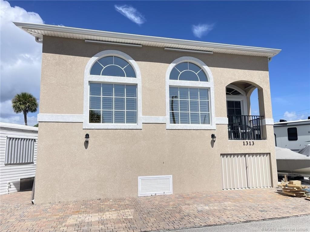 Photo of 1313 Nettles Boulevard, Jensen Beach, FL 34957 (MLS # M20051796)