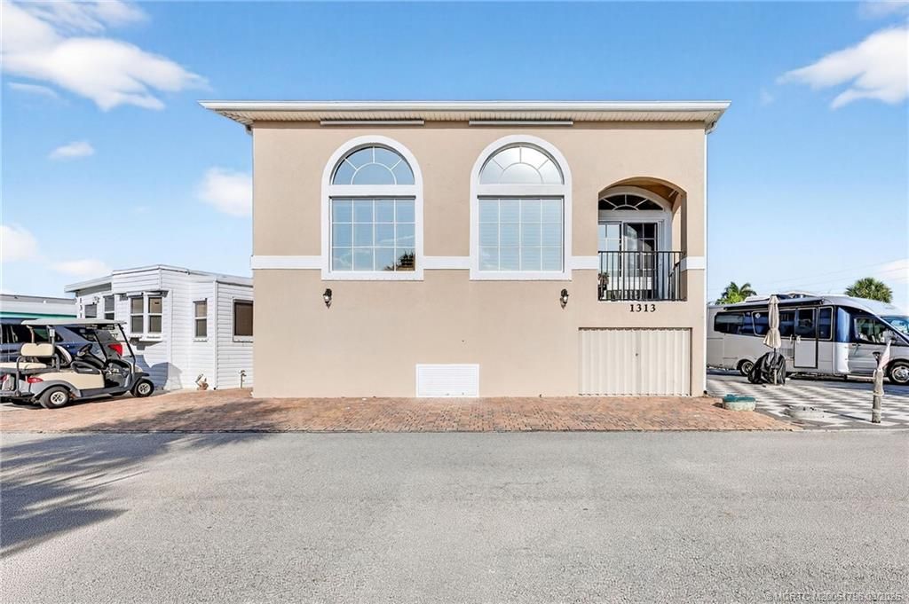 Photo of 1313 Nettles Boulevard, Jensen Beach, FL 34957 (MLS # M20051796)