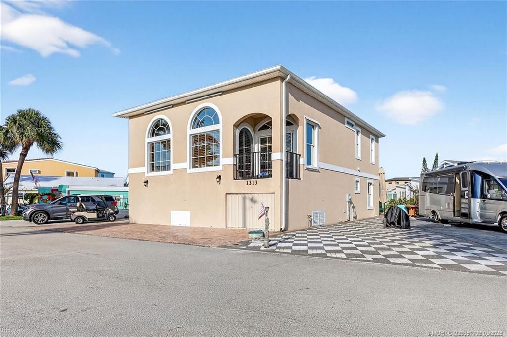 Photo of 1313 Nettles Boulevard, Jensen Beach, FL 34957 (MLS # M20051796)