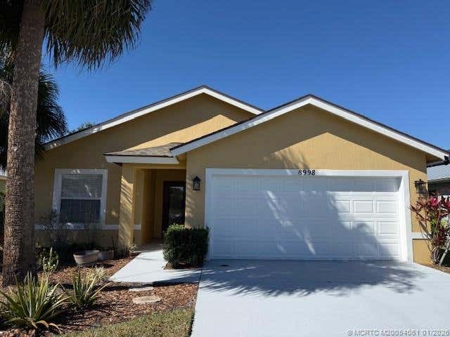 Photo of 8998 SW Bonneville Drive, Stuart, FL 34997 (MLS # M20054061)
