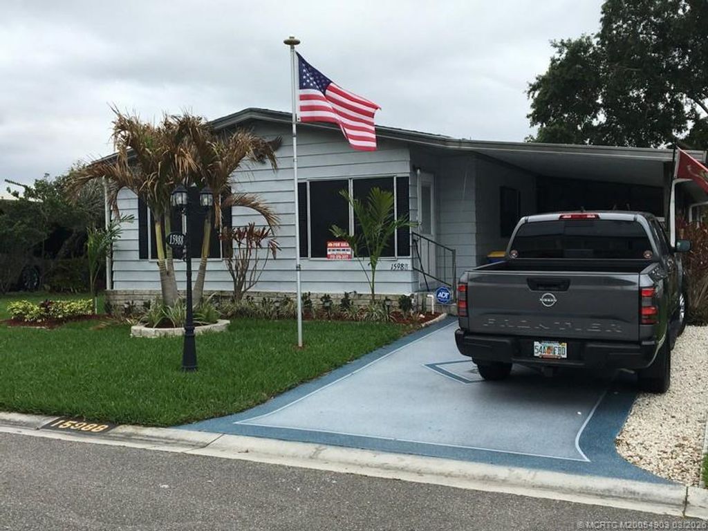 Photo of 15988 SW Indianwood Cir Cir #F-39, Indiantown, FL 34956 (MLS # M20054903)