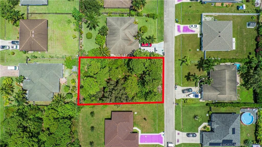 Photo of 3282 SW Crumpacker Street, Port Saint Lucie, FL 34953 (MLS # M20040371)