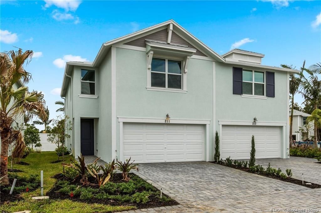 Photo of 211 Osprey Preserve Boulevard, Jensen Beach, FL 34957 (MLS # M20041921)